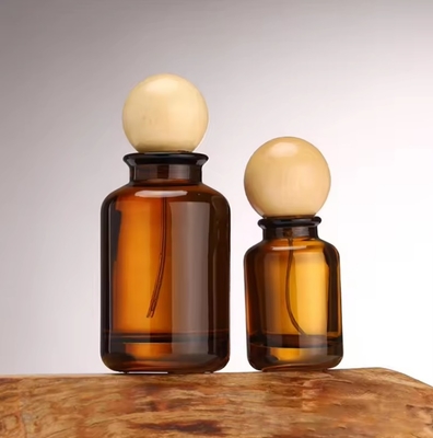 New Luxury Cylinder Shape Amber Spray Glass Bottle 30ml 50ml 100ml Cosmetic Amber Perfume Bottle With Round Wooden Lids